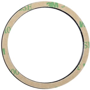 A circular adhesive tape with a brown backing and a black edge, featuring a logo.