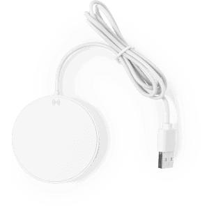 A round white wireless charger with a USB cable attached. It features a branding logo on the surface.