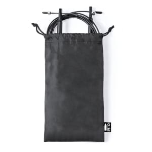 A black drawstring bag containing a skipping rope with adjustable handles. The bag has a logo but no visible text.