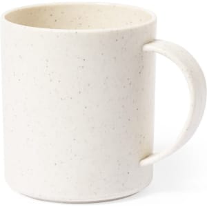 A coffee mug in a textured white design, featuring a sturdy handle and a minimalist style.