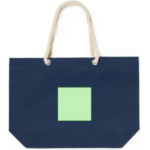 A navy tote bag with a square green patch and beige rope handles. It features a logo.