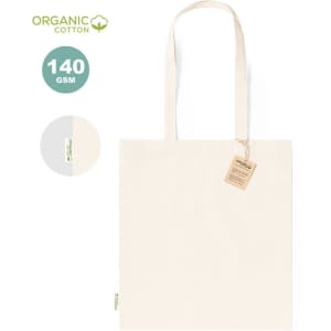 A cream-coloured tote bag made from organic cotton, featuring handles and a tag. The bag has a branding logo.