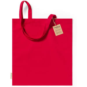A red tote bag with two handles and a tag. The bag has a simple design and a branding logo.