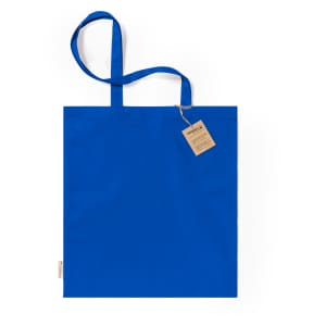 A blue tote bag with two straps and a tag attached, featuring a simple design.