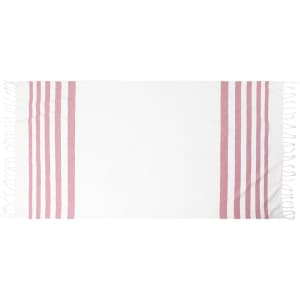 A white towel with pink stripes along the edges, featuring a decorative logo.