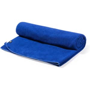 A blue absorbent towel rolled up neatly, with a soft texture and an attached logo.