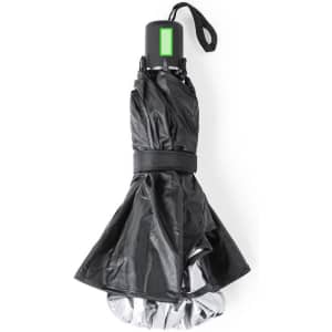 A black sunshade with a silver inner lining, tightly folded and secured with a strap. It features a handle for easy carrying.