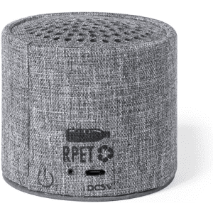 A grey cylindrical speaker with a textured fabric surface and a logo on the side, featuring control buttons.