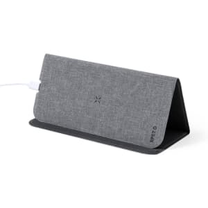 A grey wireless charger mousepad with a fabric texture and a logo on the side, designed for modern tech use.