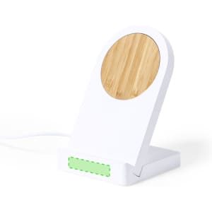 A white wireless charger with a circular bamboo section and a green accent. It has a sleek, modern design.