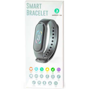 A black smart bracelet in a white box, featuring a display and various icons for functions. The box has a logo.
