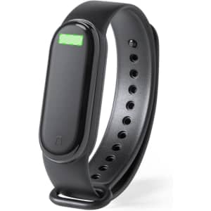 A sleek black smart bracelet with a minimalist design and a small green LED display, featuring a logo on the surface.