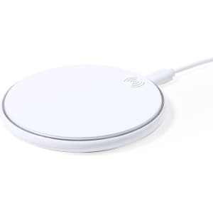 A wireless charger in a sleek, round white design with a silver trim and a connection cable attached.