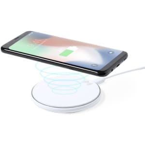 A white wireless charger with a smartphone hovering above it, displaying a charging symbol.