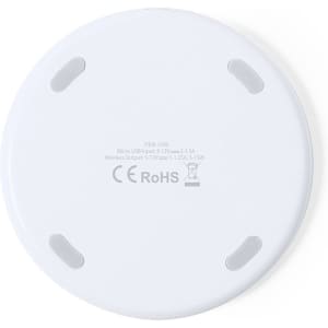 A round white wireless charger with a smooth surface and non-slip grips on the bottom.