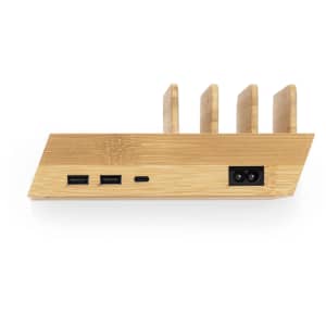 A wireless charger in a sleek bamboo design featuring multiple ports for connectivity. It has a branding logo.
