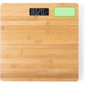 A bamboo weighing scale in natural wood colour with a digital display and a green rectangular panel.