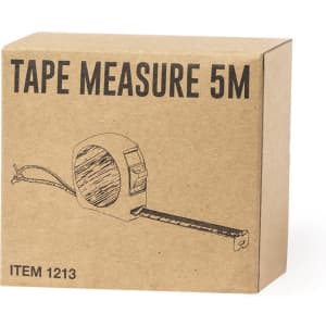 A brown cardboard box containing a 5m tape measure. The tape measure is partially extended outside the box.