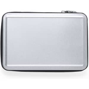 A silver tool set case with a zip closure, featuring a sleek, smooth surface. It has branding on the exterior.