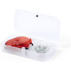 A red and white safety light set contained in a clear case, designed for outdoor use.