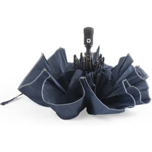 A navy Nereus umbrella opened wide, featuring a central handle and a streamlined design with grey accents.