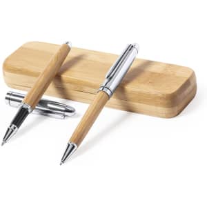 A bamboo pen set featuring two pens with silver accents, presented in a matching bamboo case.