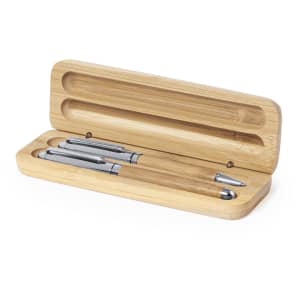 A bamboo pen case holding two silver pens, with a sleek, minimal design and open lid.