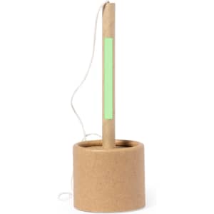 A cylindrical pen holder made from brown cardboard with a green accent and a white string attached.