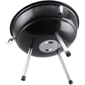 A round black barbecue grill with three metal legs and a chrome vent, featuring a sturdy design and a handle.