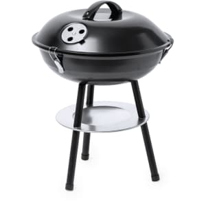 A black barbecue grill on a metal stand with a bottom shelf. It features a domed lid and side vents.
