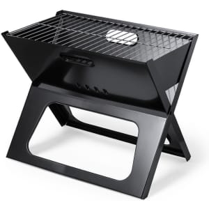 A black barbecue grill with a hinged lid and a stainless steel cooking grate, featuring a foldable design for easy storage.