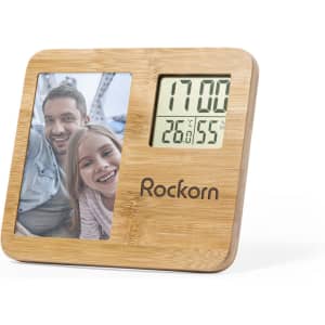 A bamboo photo frame with a digital weather station display. Features a rectangular photo slot and a logo.