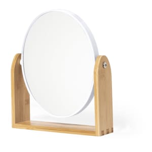 A round mirror with a white frame, supported by a bamboo stand. It has a simple, minimalist design.
