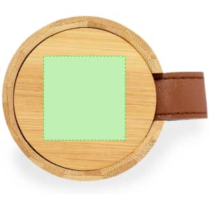 A round bamboo jewellery box featuring a green square and a brown leather handle.