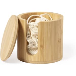 A bamboo cosmetic pad dispenser with a lid, featuring white pads inside. It has a natural wood finish.