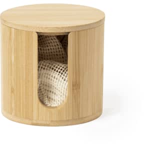 A bamboo cosmetic pad dispenser with a circular design and a window opening, revealing cotton pads inside.