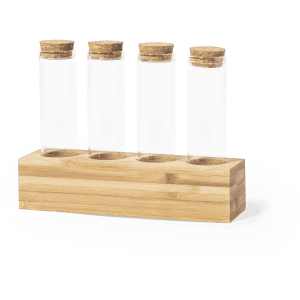 A spice set featuring four glass test tubes with cork caps, resting in a wooden holder.