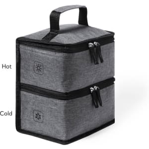 A grey cooler bag with two zippered compartments and a handle on top, featuring a logo.