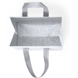 A silver and white cooler bag with sturdy handles and a reflective insulated interior.
