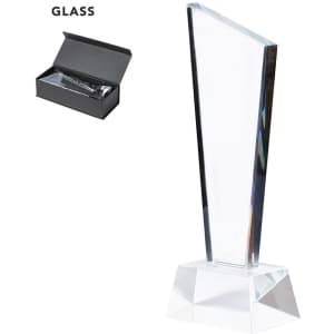 A clear glass trophy with a geometric design, presented in a black box.