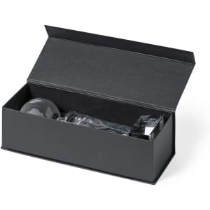 A black box containing various decorative items, including a spherical trophy and rectangular awards.