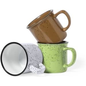 Three speckled coffee mugs stacked in a playful arrangement, featuring brown, green, and grey colours. Each mug has a handle.