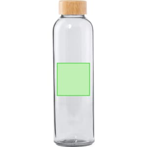 A drink bottle with a transparent glass body and a bamboo lid, featuring a blank green label.