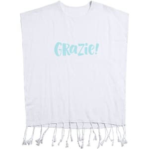 A white kaftan with a turquoise "GRAZIE!" graphic and tassel detailing at the hem.