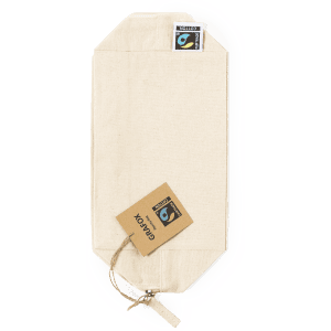 A beige toiletry bag with a zipper and tags, featuring a logo on one side.