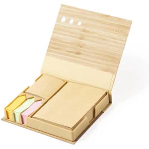 A notepad set in a bamboo-style case with sticky notes in yellow, pink, and blue, featuring a logo.