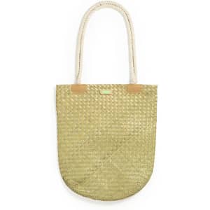 A gold tote bag with rope handles and tan accents, featuring a woven design and a small logo.
