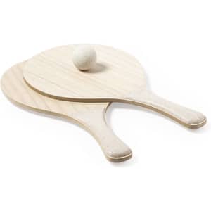 Two wooden beach rackets in a light colour with a small ball placed between them. The rackets have a simple design.