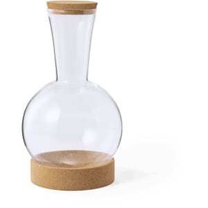A glass decanter with a cork base, featuring a clear body with a rounded bottom and a tapered neck.