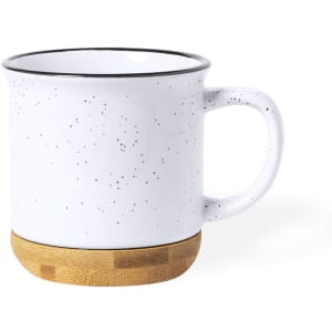 A coffee mug with a speckled white finish and a bamboo base, featuring a handle and a black rim.
